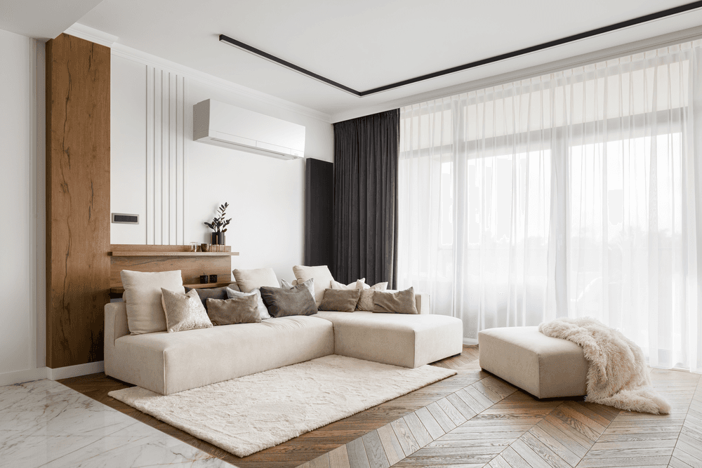 Mitsubishi mini split unit in modern luxury living room with neutral decor